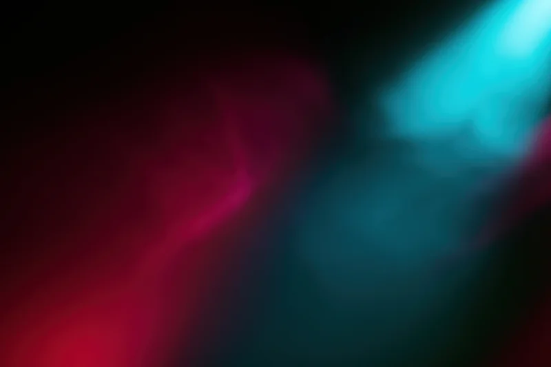 Abstract stage lighting with red and blue bokeh glow in dark setting