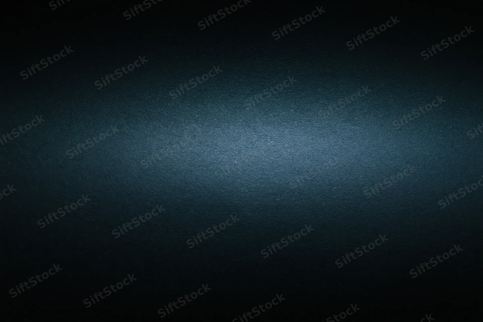 Dark charcoal matte surface with subtle gradient and soft lighting, close-up flat lay view
