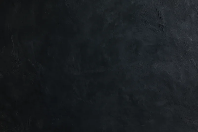 Dark textured concrete wall surface for interior design
