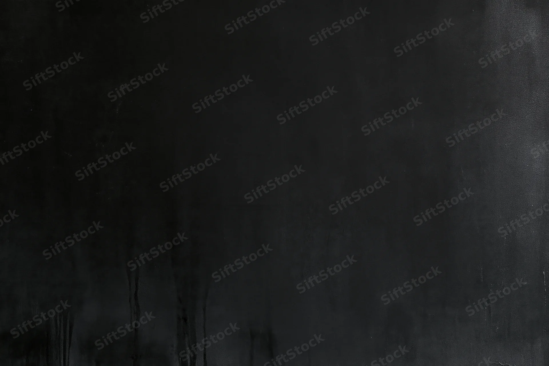Dark matte concrete surface with weathered texture and subtle streaks