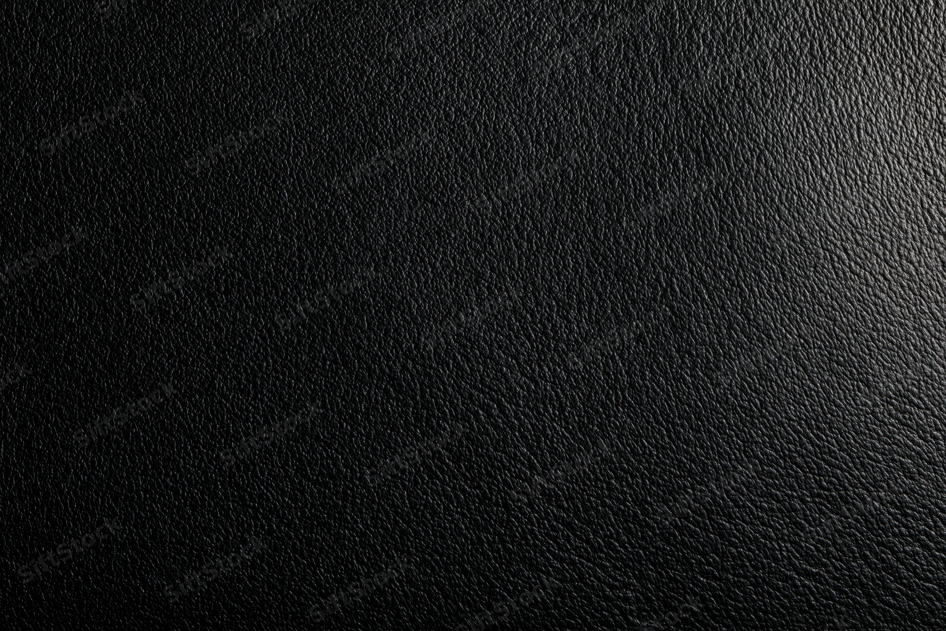 Close-up of black leather texture filling the frame