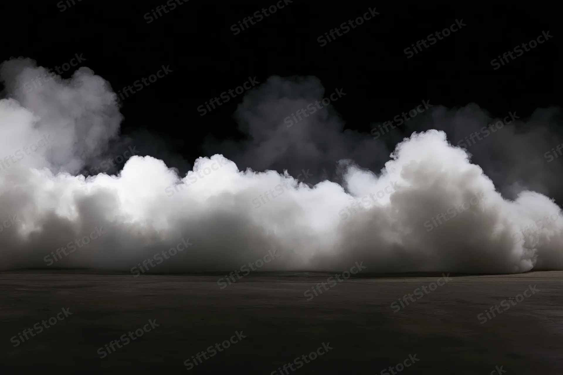 White smoke billowing upward from a dark concrete floor