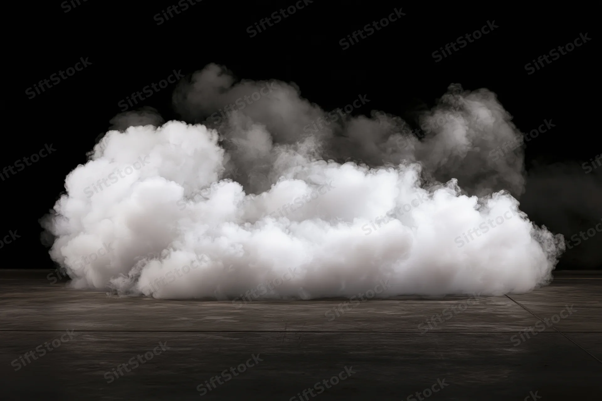 Dense white smoke billowing upward from a dark wooden floor