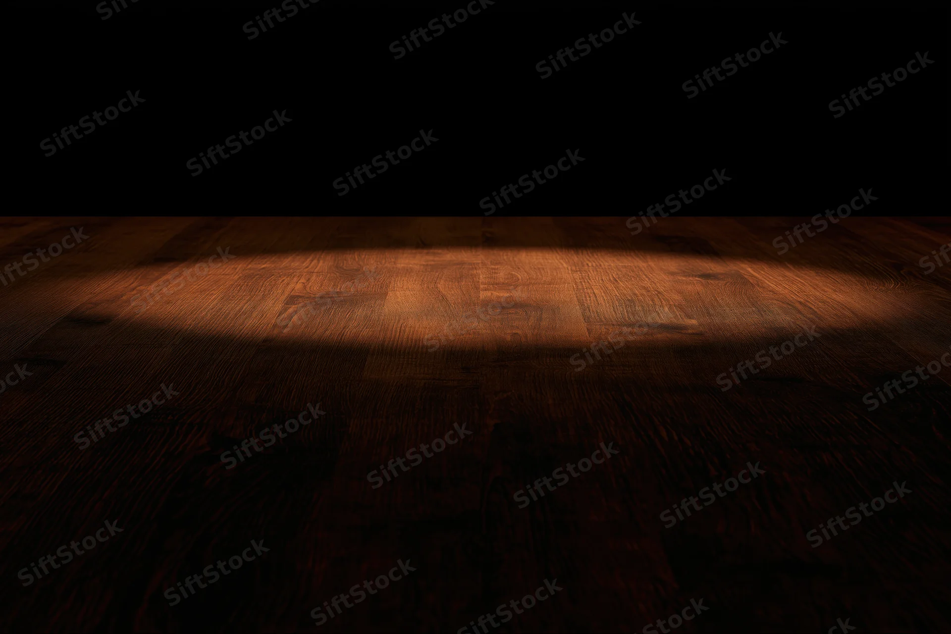 Spotlight illuminating a dark wooden floor in a dimly lit space with copyspace