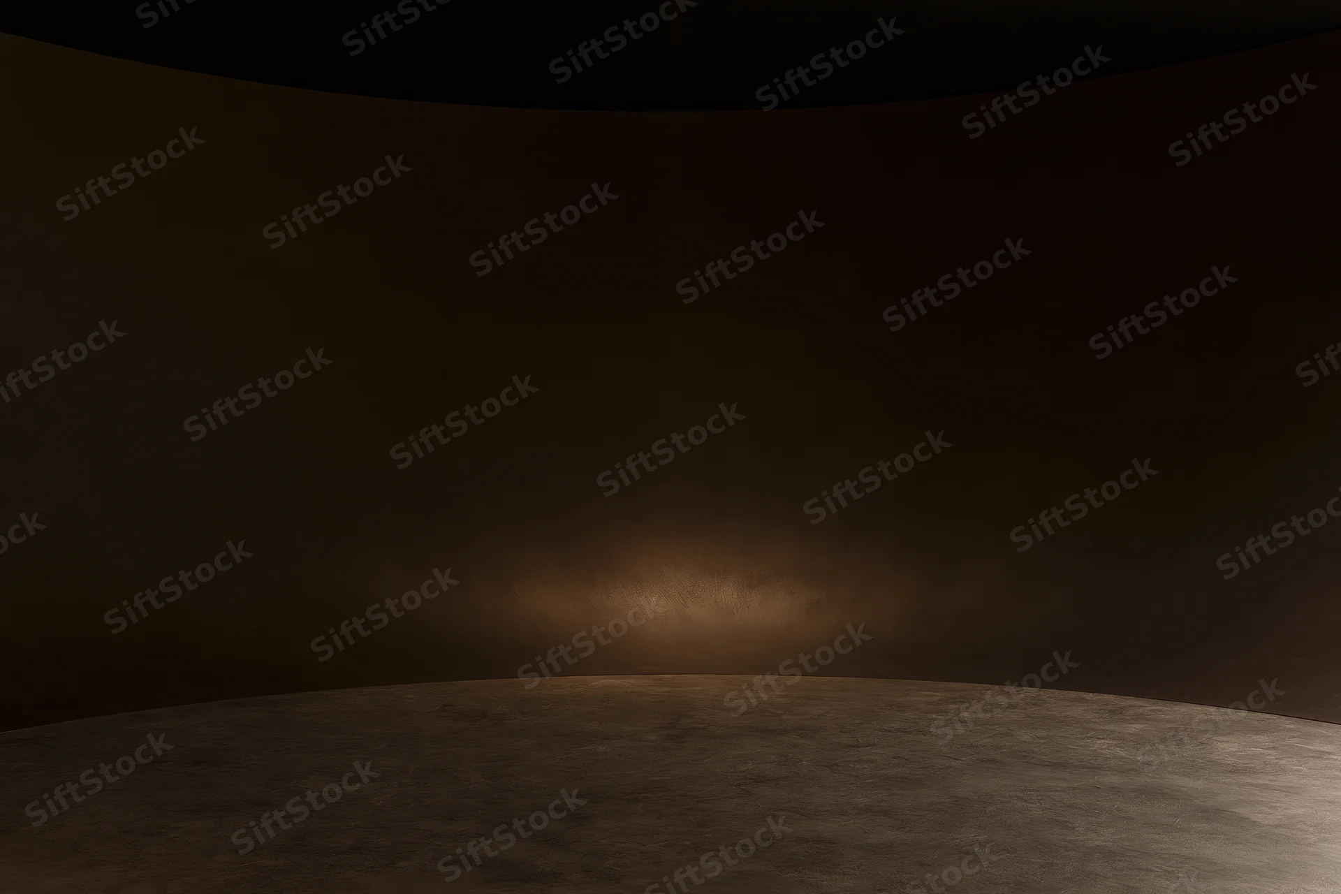 Curved seamless studio backdrop with spotlight on dark floor and wall