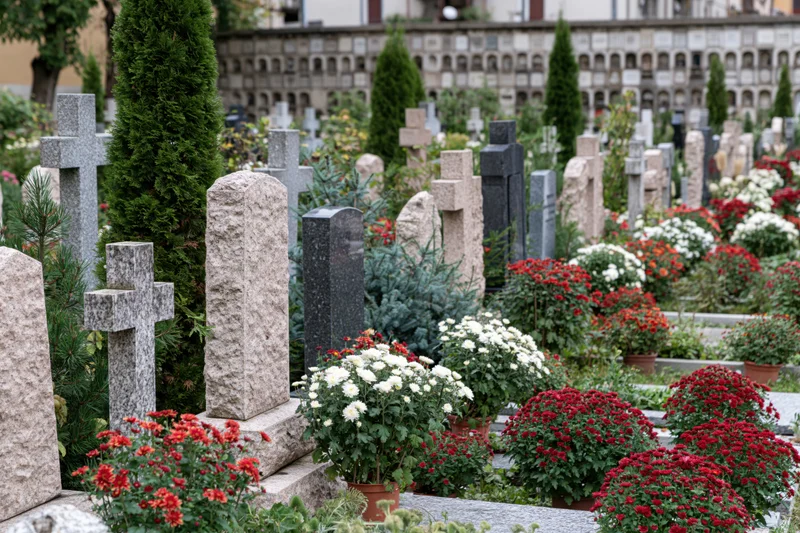 Rows of tombstones and potted flowers in an italian municipal cemetery