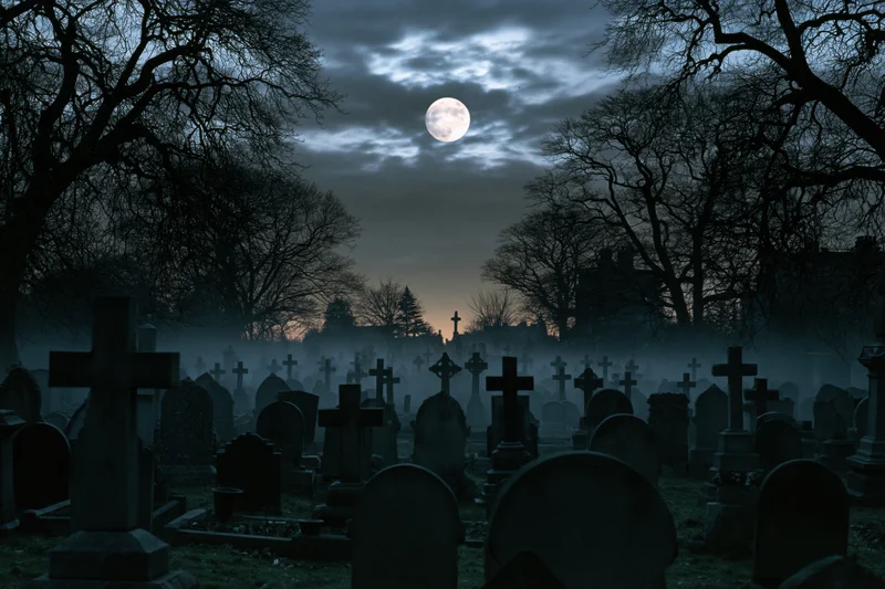 Rows of weathered gravestones in a foggy cemetery under a full moon at night