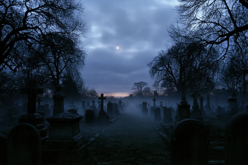 Rows of weathered gravestones in a foggy cemetery at night under a moonlit sky