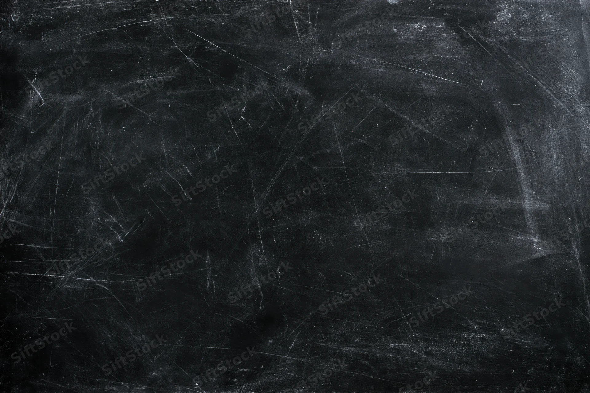 Worn blackboard surface with faint chalk smears and scratches