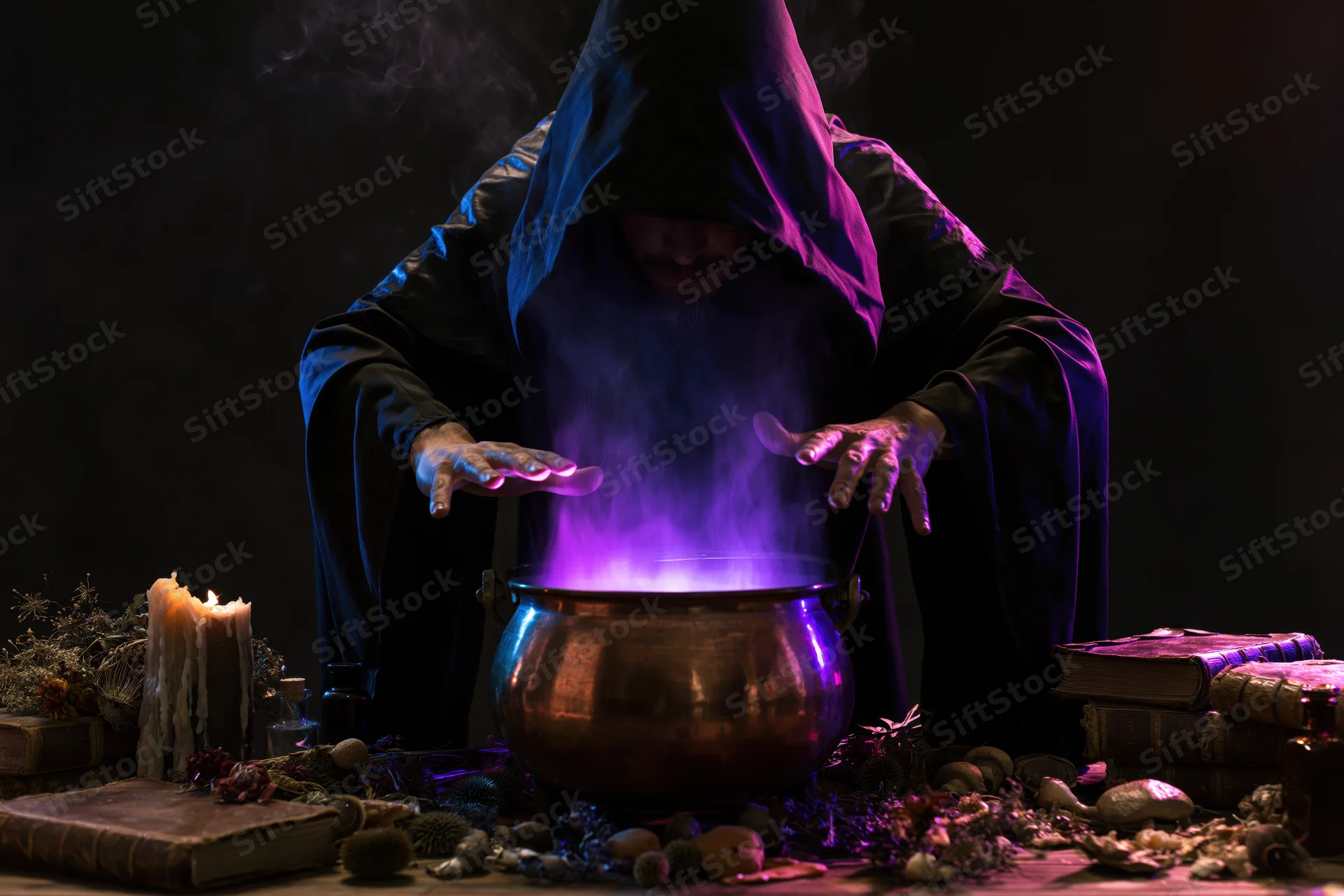Hooded wizard casting a spell over a glowing purple cauldron on a cluttered table with books and herbs