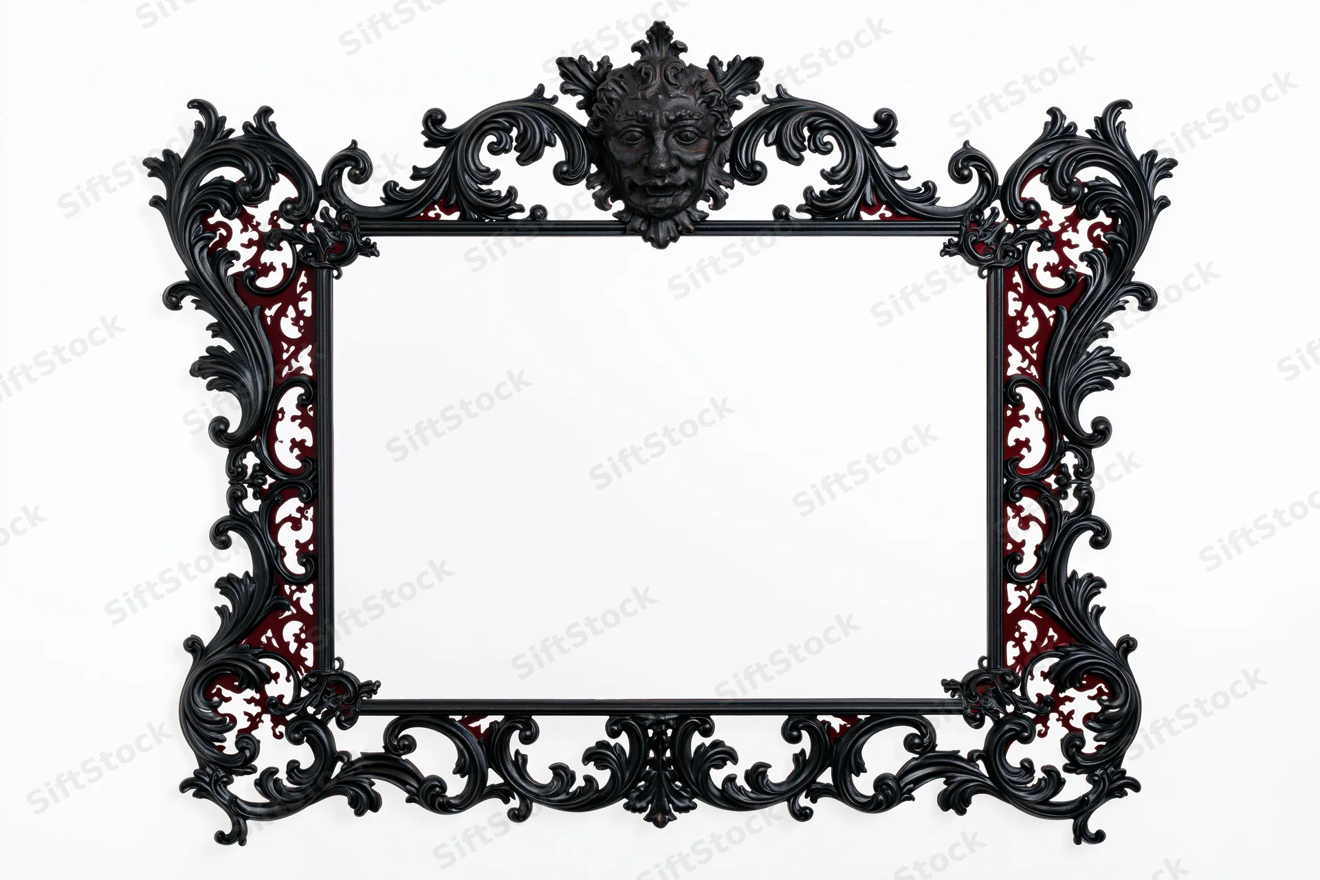 Ornate black gothic victorian frame with carved scrollwork and central mask on white background