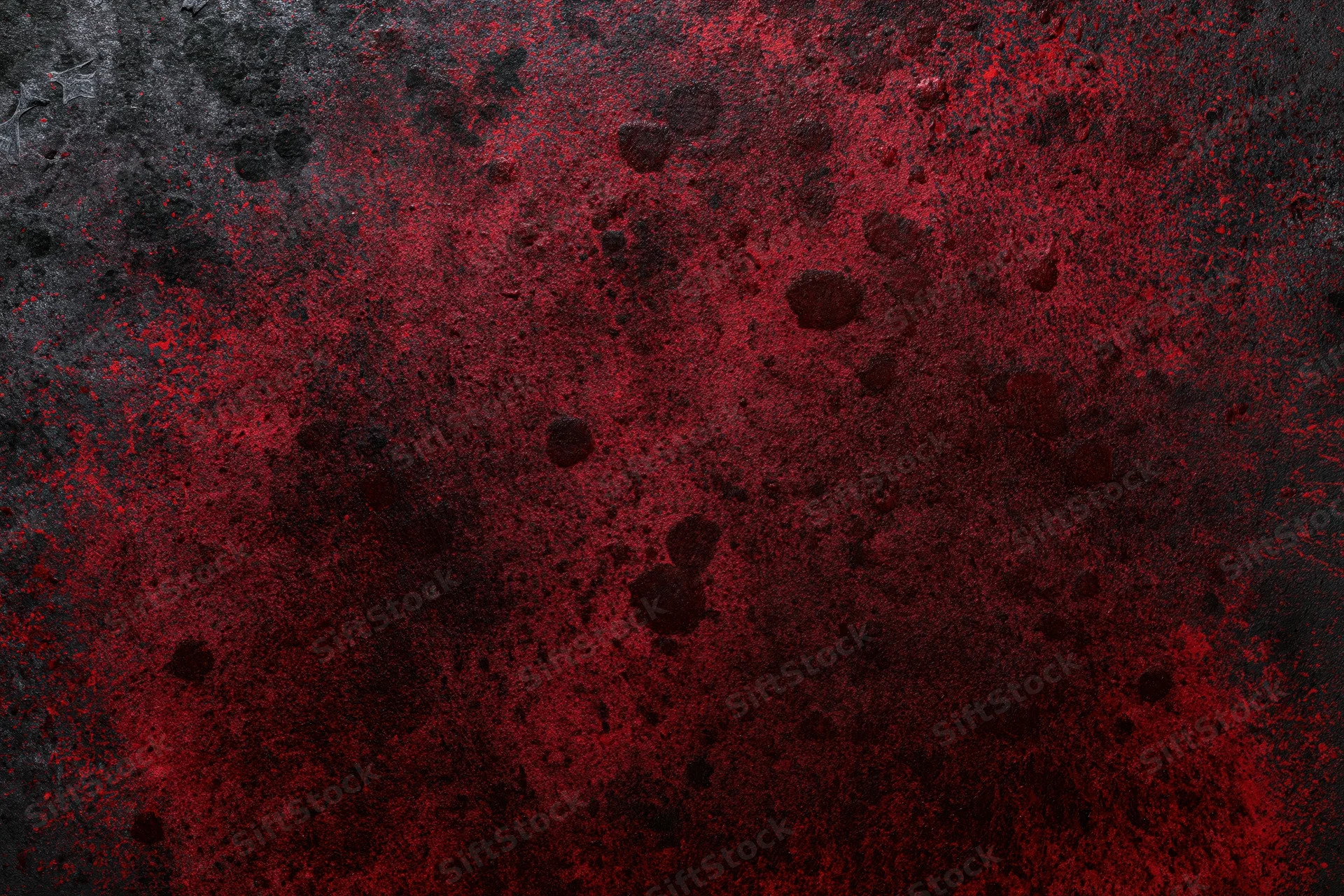 Abstract red and black grunge texture on rough concrete or metal surface
