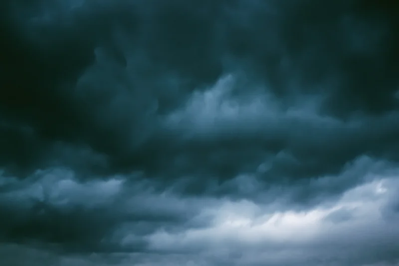 Dark stormy sky filled with heavy roiling clouds