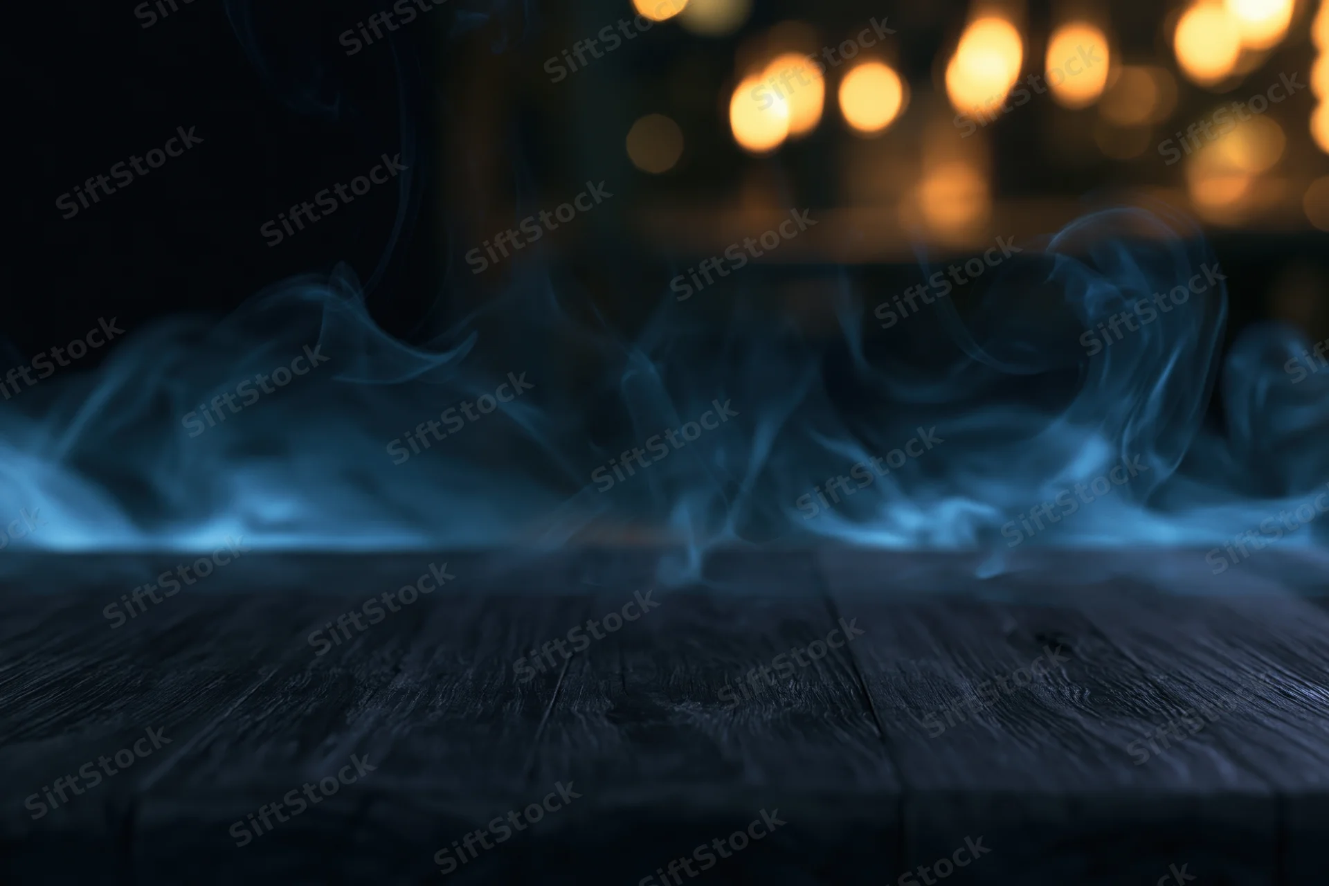 Dark wooden table surface with blue smoke rising in dimly lit interior, warm bokeh lights in background