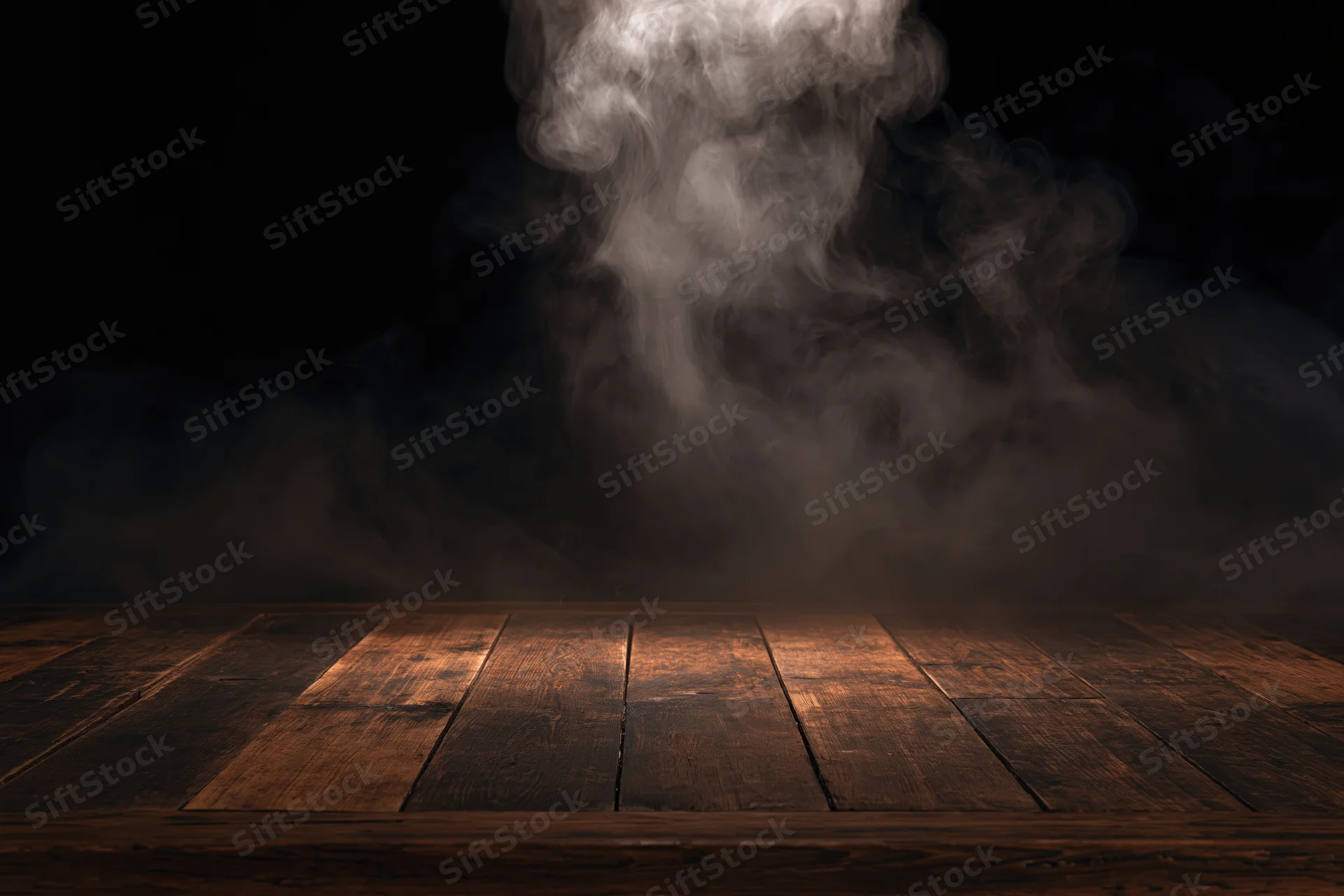Dark wooden table surface with rising smoke in a moody atmosphere