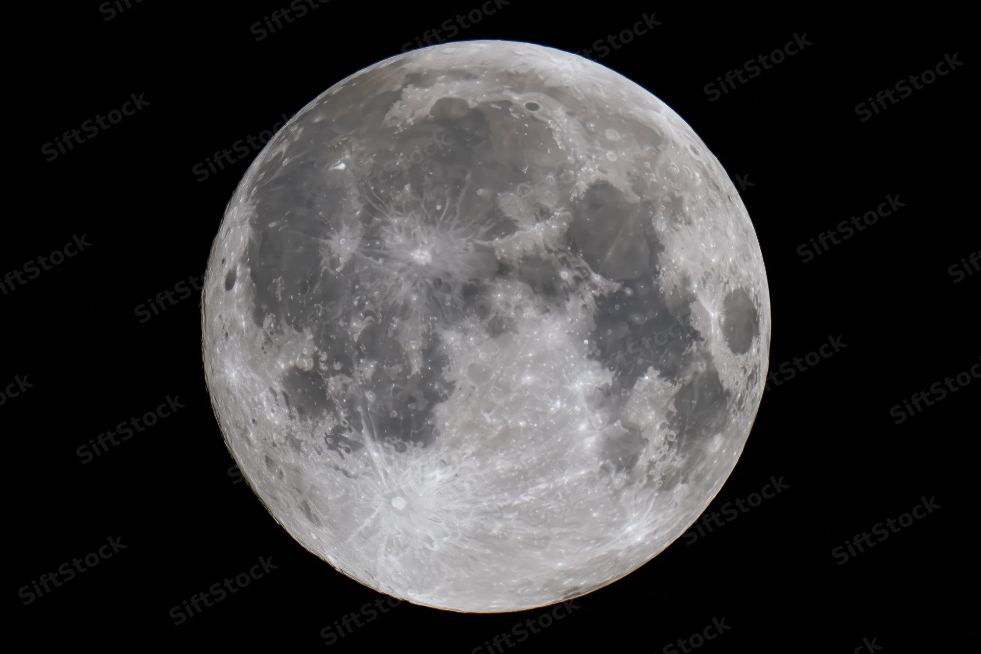 Full moon filling the frame against a black sky