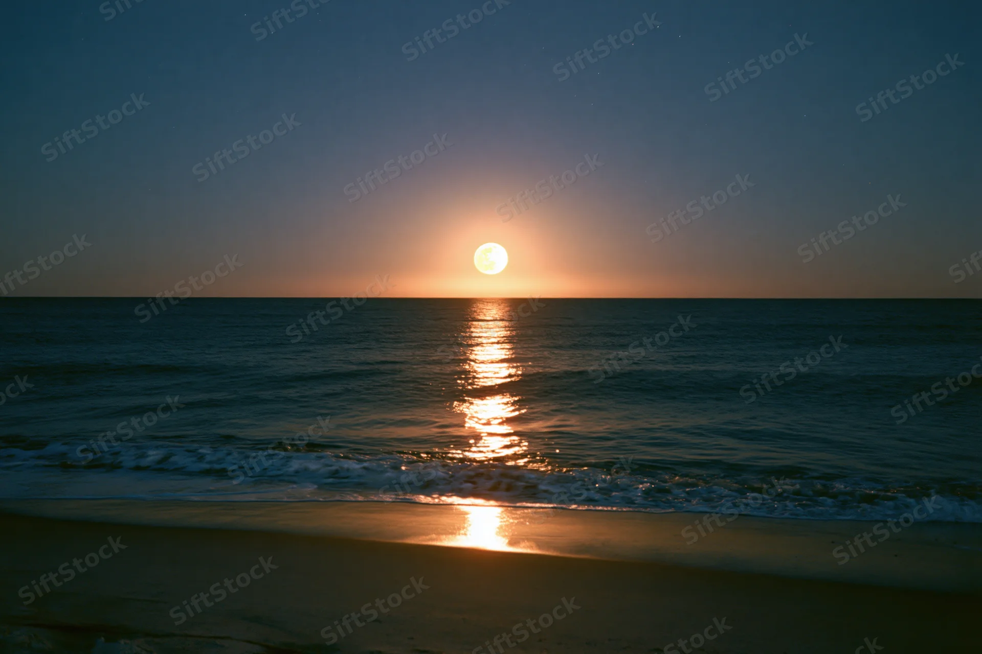 Full moon rising over calm ocean at night, reflecting on water and sand near shoreline