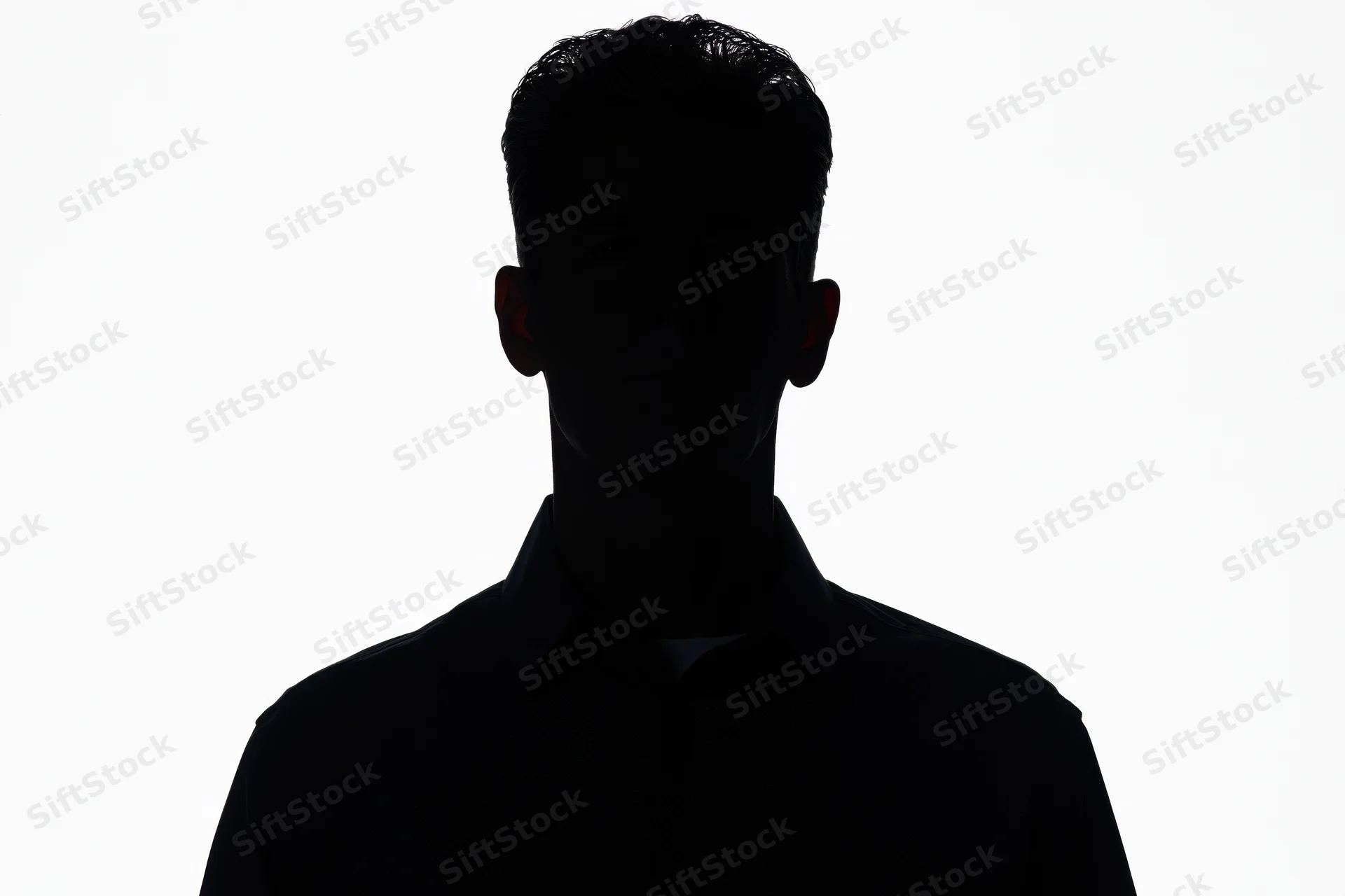 Silhouette of a man in a collared shirt facing forward against white background