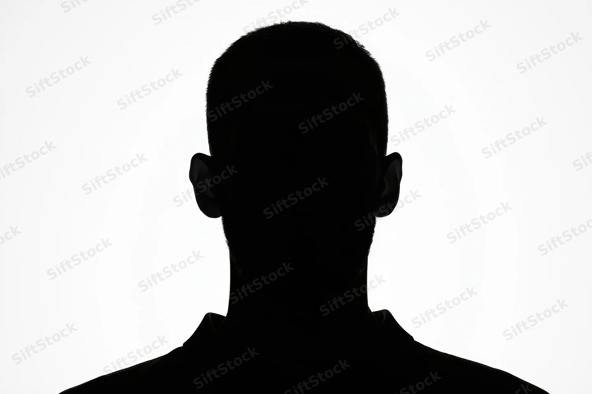 Silhouette of a man facing forward showing head and shoulders against white background