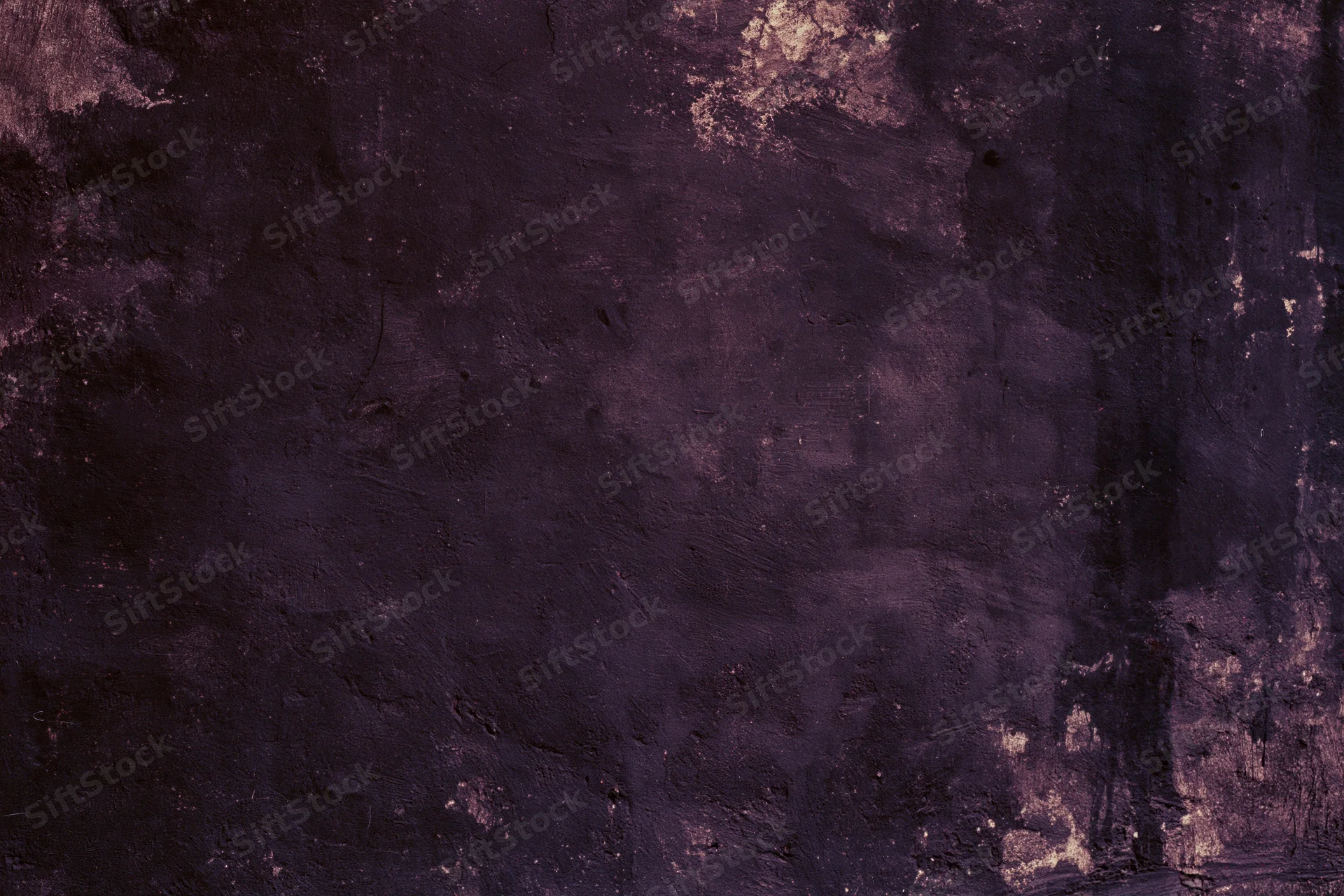 Weathered concrete wall surface filling the frame with dark purple and gray tones