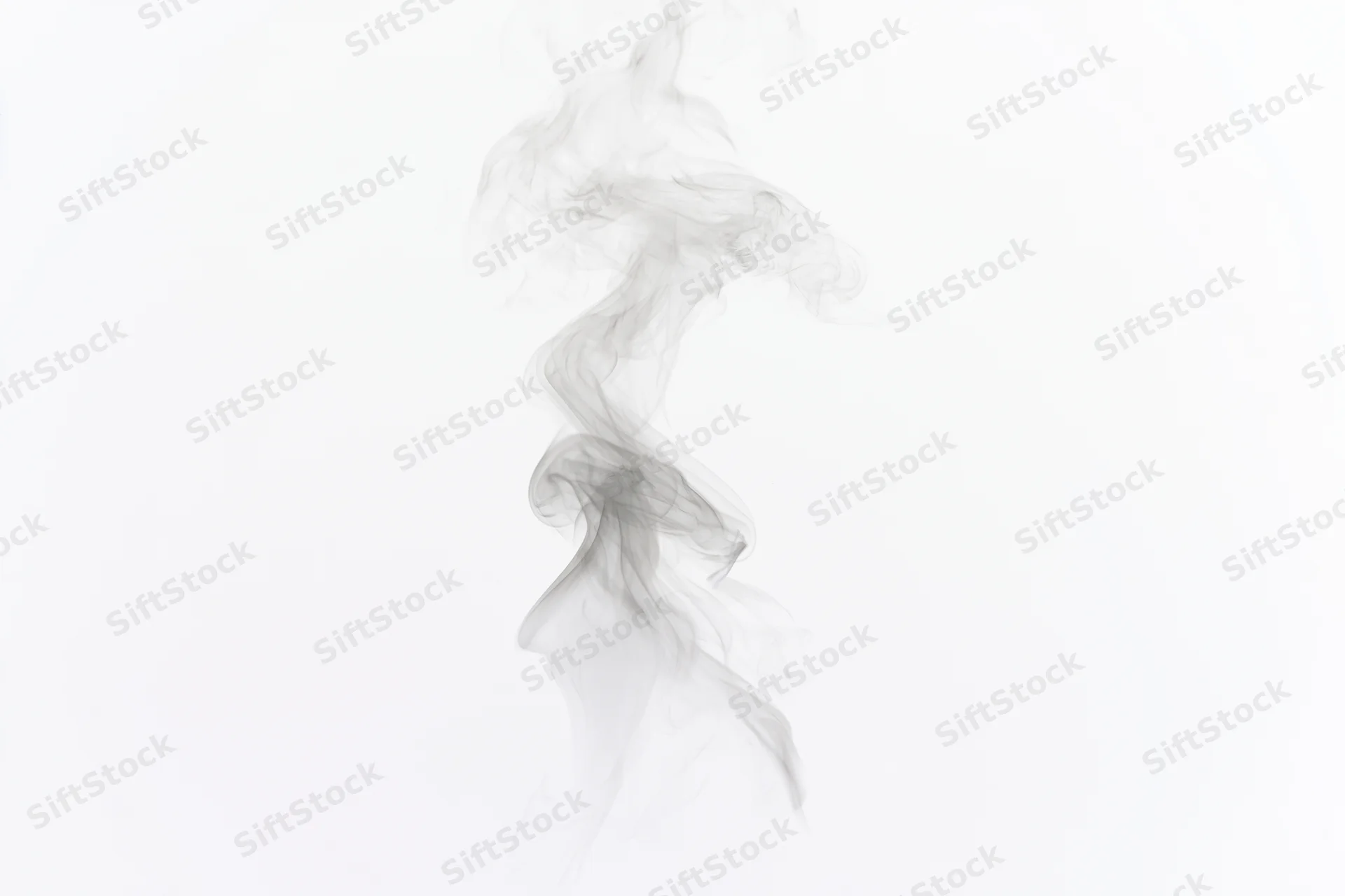 Wispy smoke plume rising and curling mid-air against a white background