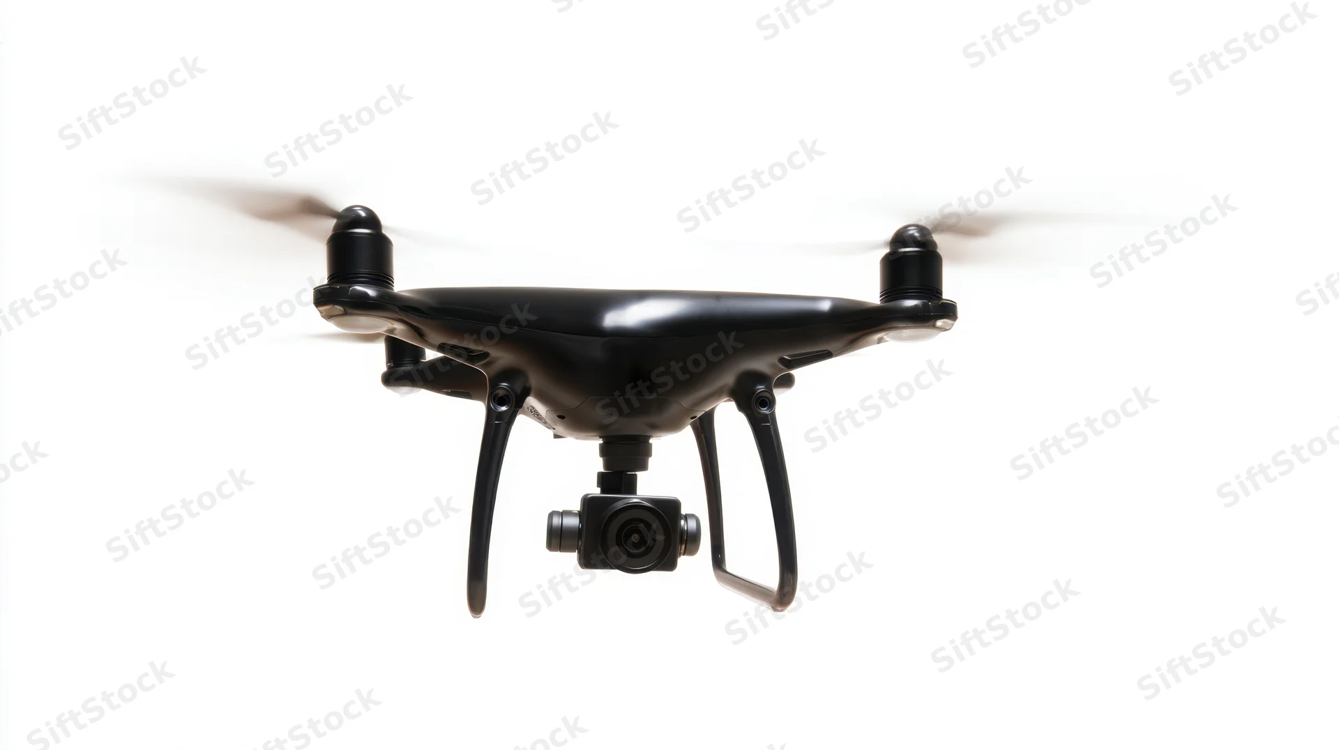 Black quadcopter drone hovering with camera attached, isolated on white background